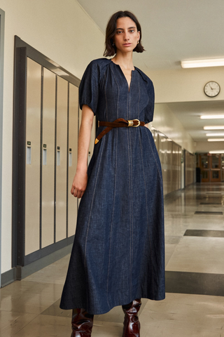 Tanya Taylor Piper Dress in Midnight Rinse dark indigo denim with short puff sleeves and a fit-and-flare midi silhouette.