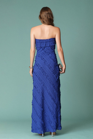 English Factory Strapless Ruffled Maxi Dress in Cobalt featuring a strapless neckline and diagonal ruffle detailing.