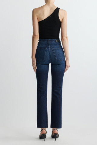 DL1961 Halle Straight Jean in Mediterranean featuring a high-rise straight-leg silhouette in a beige-tinted dark indigo wash.