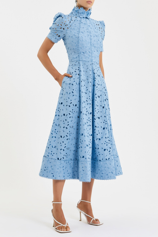 Rebecca Vallance Kitsu Midi Dress in blue broderie anglaise with floral neckline, short sleeves, and full midi skirt