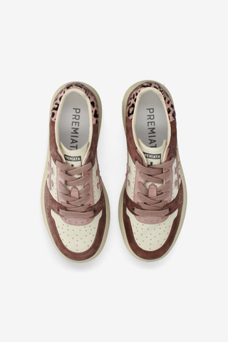 Premiata Quinn-D 8645 Sneaker in pink, white and burgundy with mixed leather panels and a rubber sole.