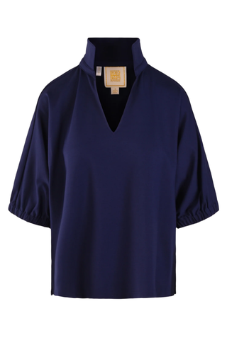 Model wearing the Emily McCarthy Poppy Top in Navy Cotton Poplin with relaxed dolman sleeves and a notched neckline.