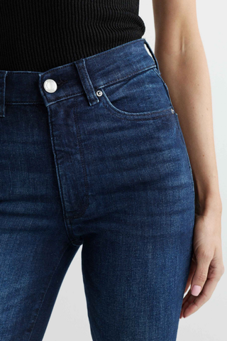 DL1961 Halle Straight Jean in Mediterranean featuring a high-rise straight-leg silhouette in a beige-tinted dark indigo wash.