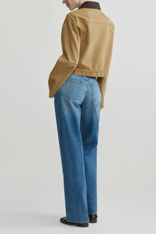 DL1961 Kaylen Soft Curve Jean in Authentic classic blue denim with a high rise and relaxed curved leg.