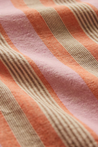 Z Supply The Perfect Striped Linen Button Up featuring coral and pink vertical stripes, relaxed fit, chest pocket, and lightweight linen blend fabric