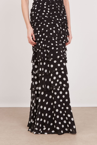 SALONI Niki Maxi Dress in Polka Scatter featuring a black and white polka-dot print, fitted bodice, thin straps, and floor-length skirt.