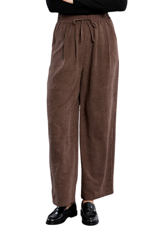 Molly Bracken Woven Pants in chocolate brown with a gathered waist, front pleats, and relaxed wide-leg silhouette.