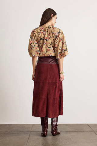 Tanya Taylor Combo Hudson Skirt in Deep Redwood featuring a burgundy suede A-line silhouette with a contrasting leather waistband and front slit.