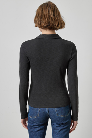 Lilla P Long Sleeve Polo Tee in Black featuring a ribbed cotton knit, polo collar, split neckline, and slim long-sleeve silhouette.