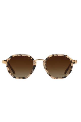 Krewe Dakota Sunglasses in Matte Oyster featuring an octagonal acetate frame, gold-tone bridge, and brown gradient lenses.