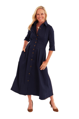 C.K. Bradley Monaco Dress in Navy featuring an A-line midi-maxi silhouette, point collar, tortoise buttons, and three-quarter sleeves.