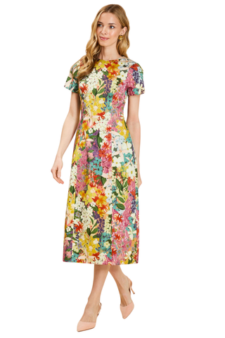 Mestiza Hampton Convertible Midi Dress in Midnight Meadows featuring a colorful floral print, short sleeves, and a column-style midi silhouette.