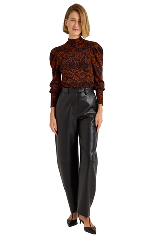 Marie Oliver Harlow Pant in Black featuring sleek vegan leather, a fitted waist, and modern barrel-leg silhouette.