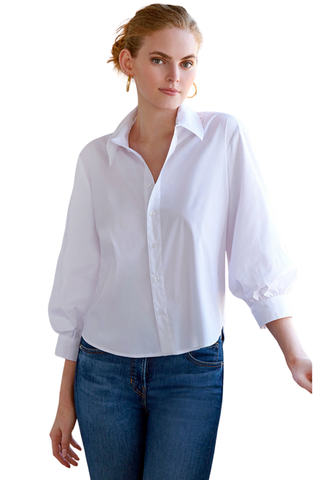 Finley Cora Shirt in White featuring silky poplin fabric, a classic collared neckline, button-front closure, three-quarter-length blouson sleeves, and a flattering semi-fitted silhouette with a high-low hem.