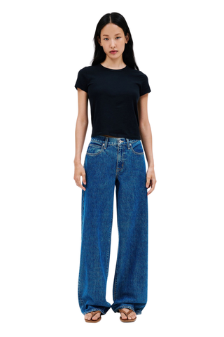 SLVRLAKE Mica Jeans in Sweet Memory featuring a relaxed low-rise fit, wide-leg silhouette, and timeless mid-indigo wash.