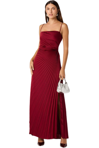 ASTR Paulette Dress in Wine featuring spaghetti straps, draped neckline, pleated floor-length silhouette, and thigh-high side slit.
