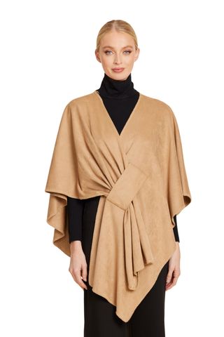 Dolce Cabo Faux Suede Wrap in Camel featuring a soft suede-like finish, draped cape silhouette, and elegant twist-front detail.