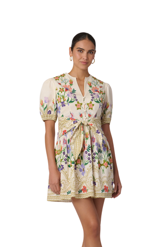 Shoshanna Tinsley mini dress in lilac, tangerine, and sand floral print featuring puff sleeves, a fitted waist with tie detail, and gathered skirt
