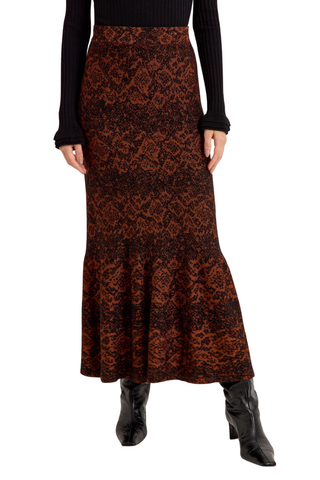 Shiloh Skirt in Oxide featuring a rust and black abstract print, fitted silhouette, and softly flared mermaid hem.