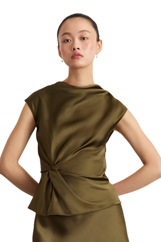 Tanya Taylor Robin Top in Fern olive green satin crepe with a mock neckline, cap sleeves, and twisted waist detail.