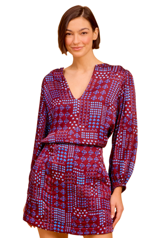 Olivia by Livro Effie Top in Alpine Sprigs featuring a burgundy, pink, and blue geometric floral print, deep V-neckline, and long sleeves.