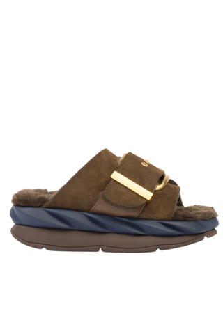 4CCCCEES Mellow Laze Sandal in Chocolate with sheep shearling lining, oversized metal buckle, and navy ripple-designed sole.