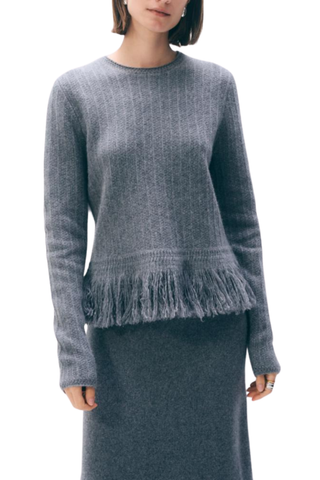 White + Warren Cashmere Blend Fringe Top in Dark Steel Heather featuring a crew neckline, long sleeves, relaxed silhouette, and textured fringe detailing along the hem.