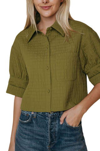 Olive textured button-front blouse with short puff sleeves.