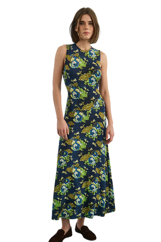 Hunter Bell Barker Dress in Primrose featuring a colorful floral print, sleeveless bodice, and flowing maxi-length silhouette.