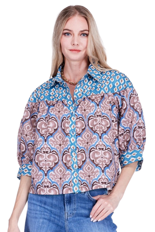 JoyJoy Round Yoke Blouse in Persian Gate featuring an ornate blue and neutral print, contrast yoke and cuffs, and relaxed three-quarter sleeves.