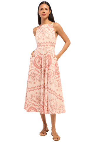 Model wearing the Misa Amity Dress in Terra Ceramic featuring a sleeveless fitted bodice, high neckline, Terra Ceramic print, and box-pleated midi skirt.