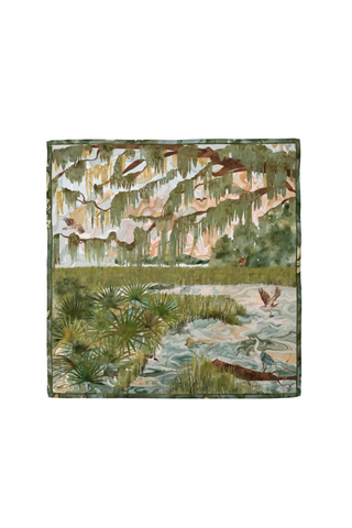 Swells Charleston Marsh silk scarf featuring a painted Lowcountry marsh landscape with palmettos, waterways, and soft green tones