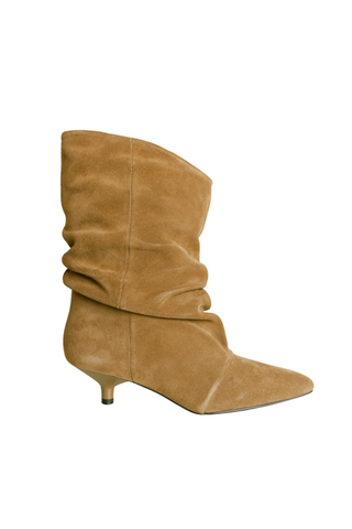 Bibi Lou Drape Bootie in Cuero featuring a warm tan finish, slouchy draped shaft, pointed toe, and slim kitten heel.