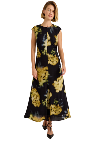 Marie Oliver Zuri Dress in Lush featuring oversized golden florals on a black background with a fluid sleeveless maxi silhouette.
