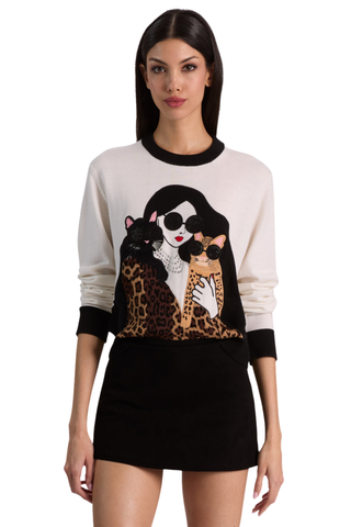 Alice + Olivia Gleeson Staceface Leopard Pullover in soft white with black trim, embellished Staceface graphic, and leopard print details.