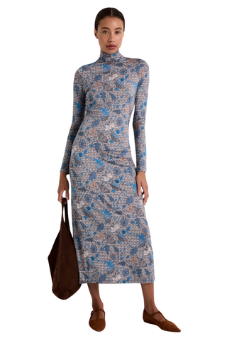Marie Oliver Paxton Dress in Aegean featuring a blue printed stretch jersey, long sleeves, turtleneck, and body-skimming silhouette.