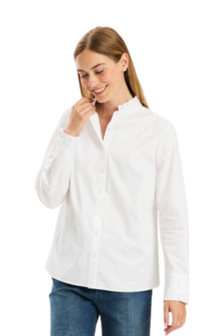 Tyler Boe Gwen Ruffle Shirt in White featuring a collared neckline, long sleeves, button-front design, and feminine ruffle detailing.