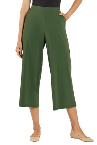 Model wearing the Jude Connally Lolly Pants in Loden with a cropped wide-leg silhouette.