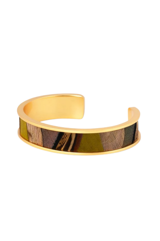 Brackish Laramie Thin Cuff bracelet featuring handcrafted golden peacock, pheasant, and turkey feathers set in a 24K gold-plated adjustable cuff bracelet.