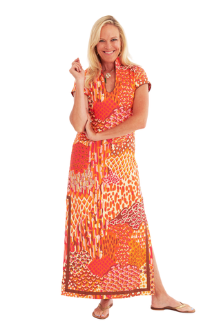 C.K. Bradley Tarpon Dress in Popplet Autumn orange and pink print with short sleeves and a flowing maxi silhouette.