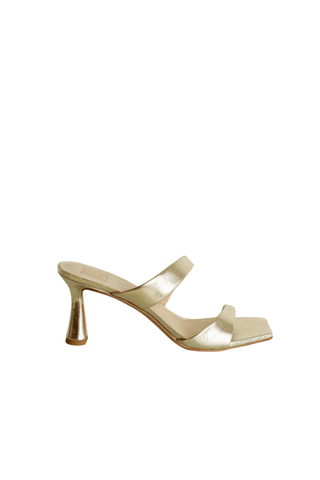 Dolce Vita Icelyn Heel in platinum metallic leather featuring a double strap mule silhouette, square toe, and sculptural flared heel