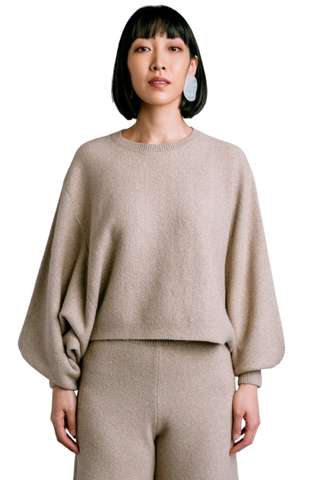 Kerisma Echo Sweater in Warm Wheat featuring an oversized crew neckline, relaxed dolman sleeves, and soft marled knit texture.