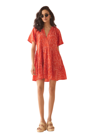 Omika Hadley mini dress in orange Uma Persimmon print with tiered skirt and tie neckline