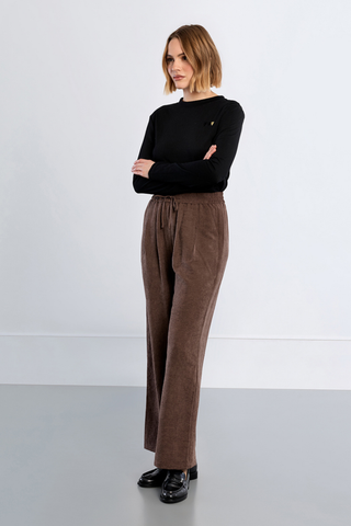 Molly Bracken Woven Pants in chocolate brown with a gathered waist, front pleats, and relaxed wide-leg silhouette.