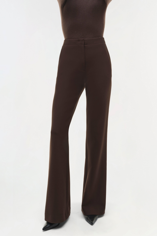 SIMKHAI Kenna Trouser in chocolate brown featuring a high-rise waist, tailored fit, and subtly flared leg.
