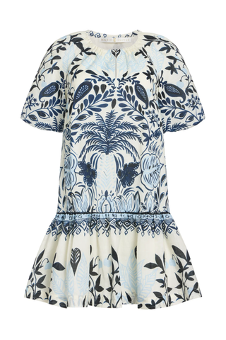 White dress with blue floral pattern on a white background