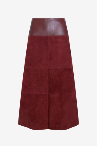 Tanya Taylor Combo Hudson Skirt in Deep Redwood featuring a burgundy suede A-line silhouette with a contrasting leather waistband and front slit.
