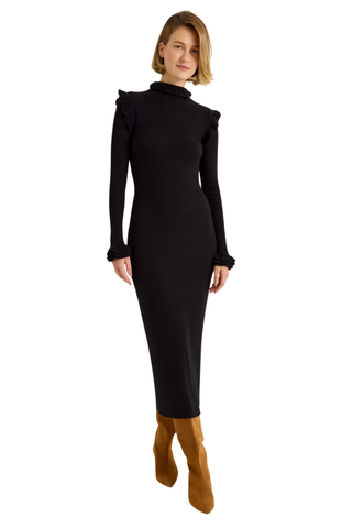 Marie Oliver Tinley Dress in Black featuring a fitted ribbed knit midi silhouette, fold-over ruffle turtleneck, and long sleeves with ruffled cuffs.