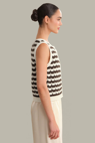 Model wearing the 525 Isla Striped Vest in Chalk Combo featuring a textured cream and brown striped knit, sleeveless silhouette, and button-front detail