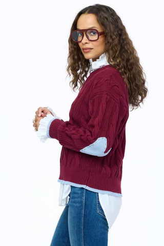 Kerri Rosenthal Maxwork Cable Pullover Sweater in burgundy featuring cable knit texture, contrast tipping, and heart elbow patches.